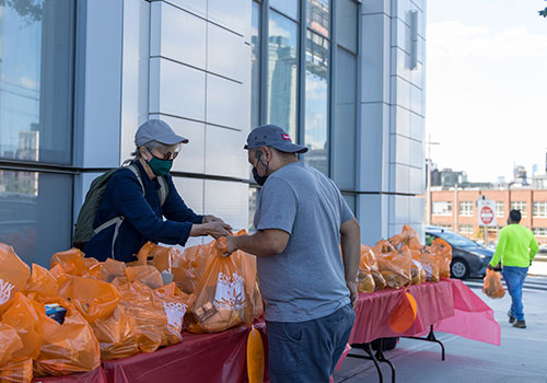 People getting food from Food Drive