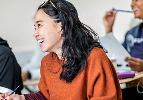 Studentsmiling while attending class