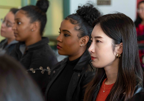 Students sitting at a conference