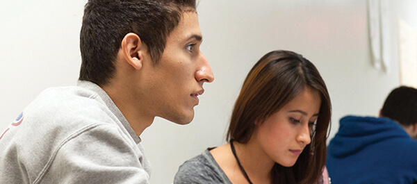 Education Associate: The Bilingual Child students listen to professor's lecture