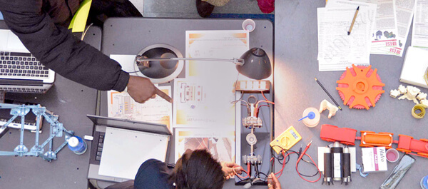 Overhead shot of Engineering student building a product