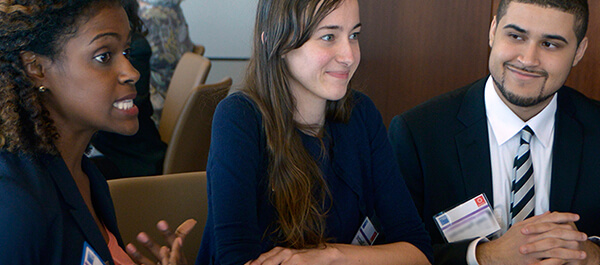 Political Science: Students in business suits attending an event