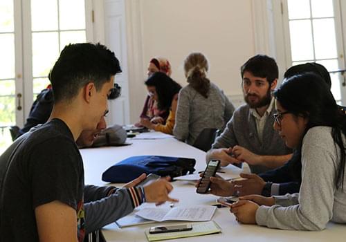 Students sitting around a table