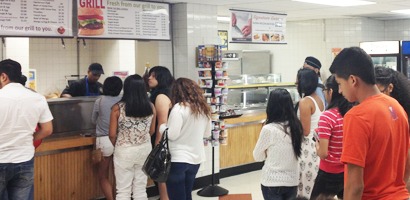 Students in line to get food at the cafeteria