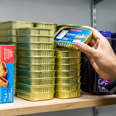 Image of student getting canned food from the Pantry