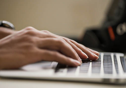 Student usaing a laptop
