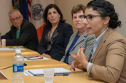 staff and students in a meeting