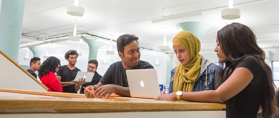 Students studying in the 2nd Floor of the Atrium