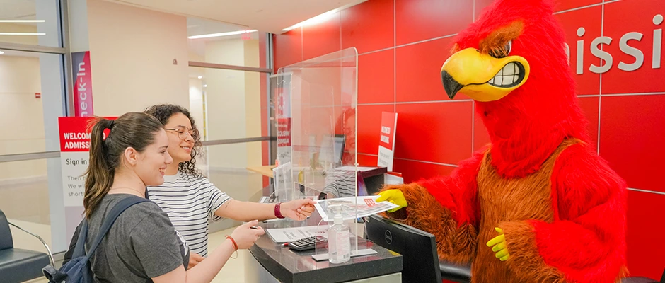 Rebel Mascot Helping Students in the Admissions Office