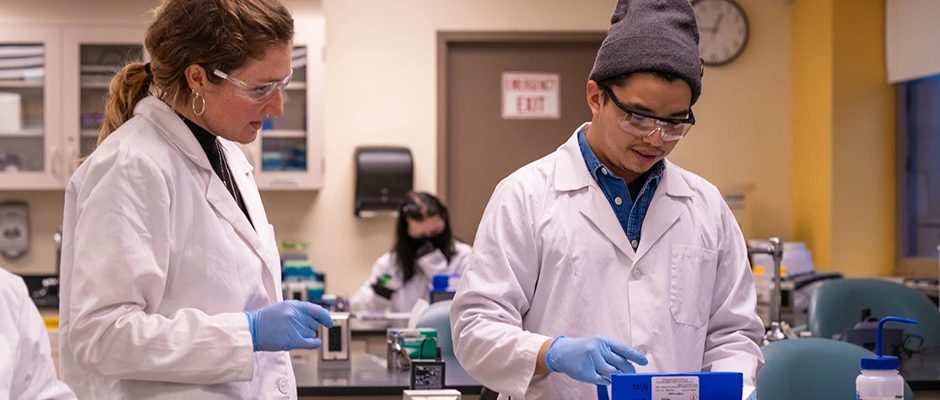 Students in Biology lab learning.