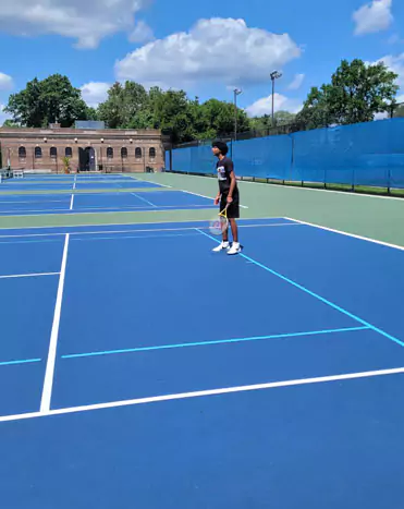 boy on tennis court