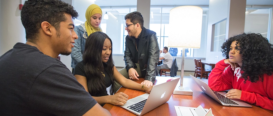 Students studying in the Library