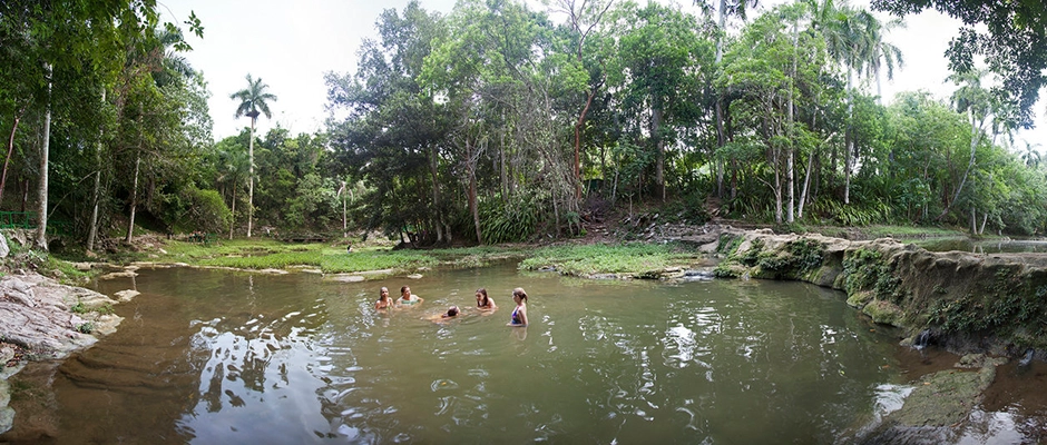 Cuban Swimming Hole with Ladies