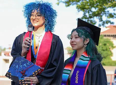 Students speaking during commencement in 2024