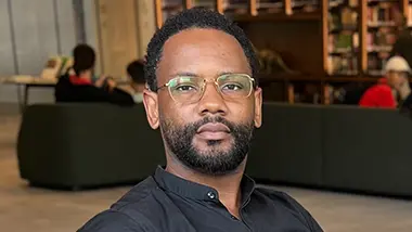 Louis Muamba Headshot Newsroom Image