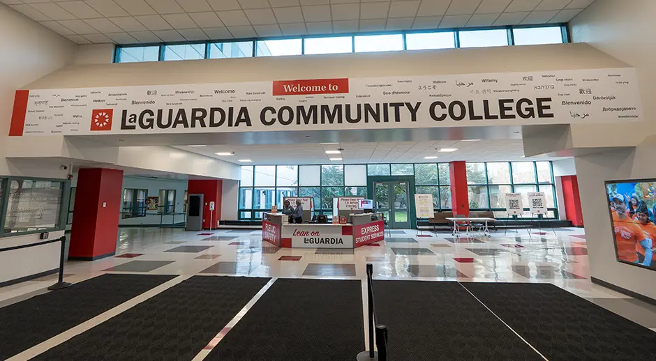 E Building Main Entrance and LobbyTo provide students, faculty, staff, and visitors with a friendly and welcoming environment when entering the College, Building Operations upgraded the E Building’s Main Entrance and Lobby.  The new lobby includes a new welcome desk, digital wayfinding signage, and a video screen for major announcements, events, and more.