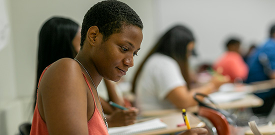 Student sitting in a classroom.